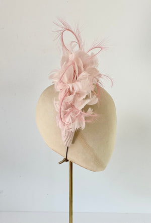 pale pink high headband with feathers wedding hat mother of the bride