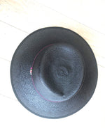 black panama wide brimmed fedora hat with cross over crown, ladies sun hat, top view