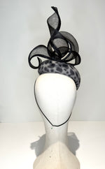 Felt fascinator black spots on grey base with crin swirls teardrop shape