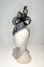 Crin Fascinator black and grey animal print for Cheltenham festival winter occasion hat