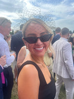 woman wearing a black veiling headpiece birdcage