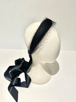 black padded halo headband with veiling and ribbon tassels