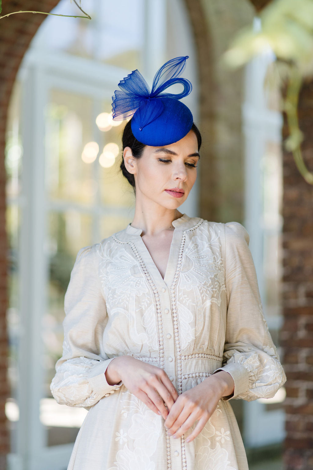 blue silk cocktail fascinator worn with hobbs neutral dress