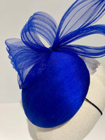 cocktail hat in blue silk close up of pleated crin