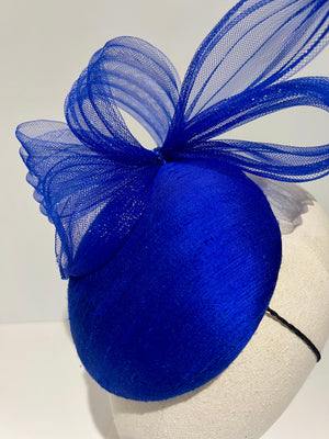 cocktail hat in blue silk close up of pleated crin