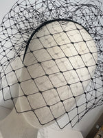 close up of black mesh headband