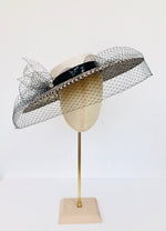 black and ivory checked panama overszied straw boater hatwith veiling and pearls, wide brimmed royal ascot races