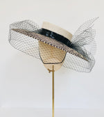 black and ivory checked panama overszied straw boater with veiling and pearls