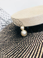 black and ivory checked panama overszied straw boater with veiling and pearls