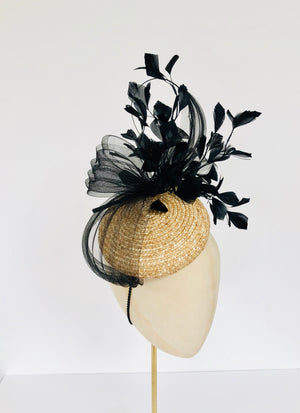 natural straw pillbox fascinator with black feather spray, pleated crin and quill