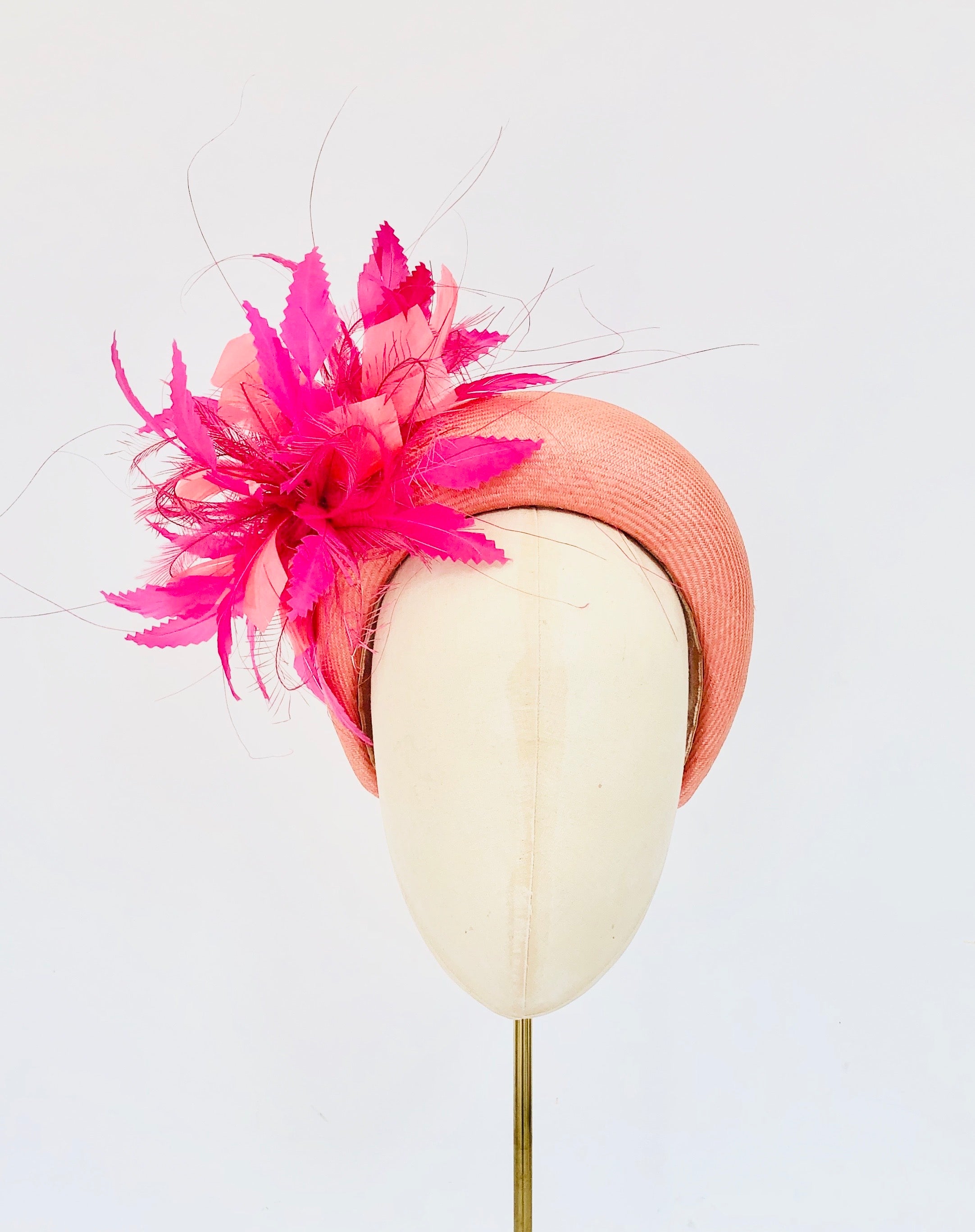 orange and pink straw padded wide headband, kate middleton style with vibrant feather spray, halo crown, ideal for races or wedding hat