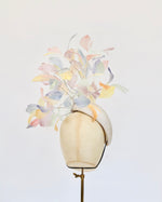 ivory teardrop straw pillbox fascinator hat with rainbow multi coloured feather spray