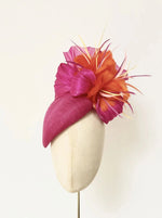 hot pink bright orange pillbox fascnator hat for weddings and royal ascot, silk abaca and feather flower finish