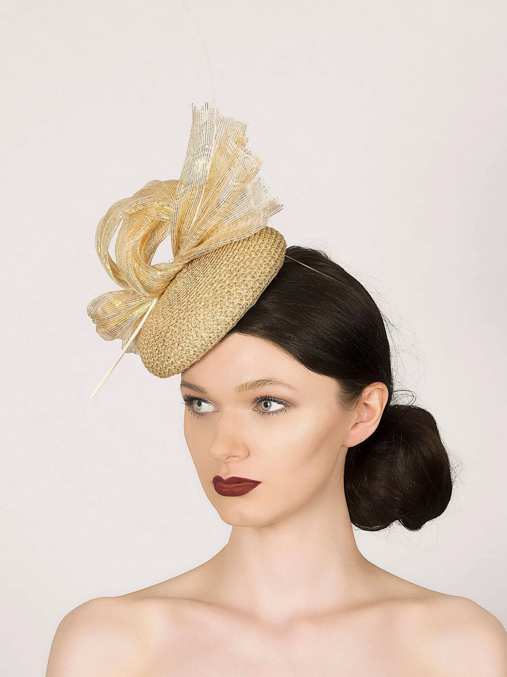 neutral gold glitter straw pillbox fascintor with silk lurex abaca loops and ivory quill, ideal for wedding guest hat or royal ascot
