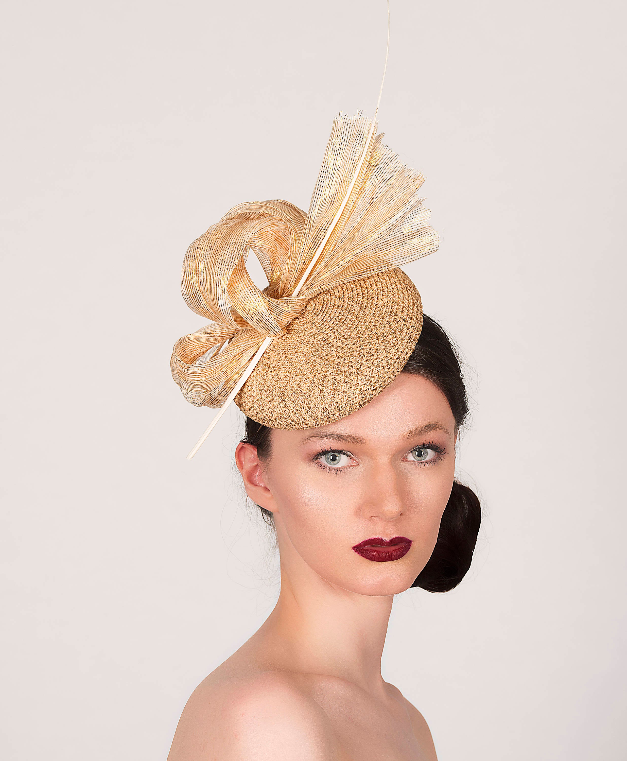 neutral gold glitter straw pillbox fascintor with silk lurex abaca loops and ivory quill, ideal for wedding guest hat or royal ascot