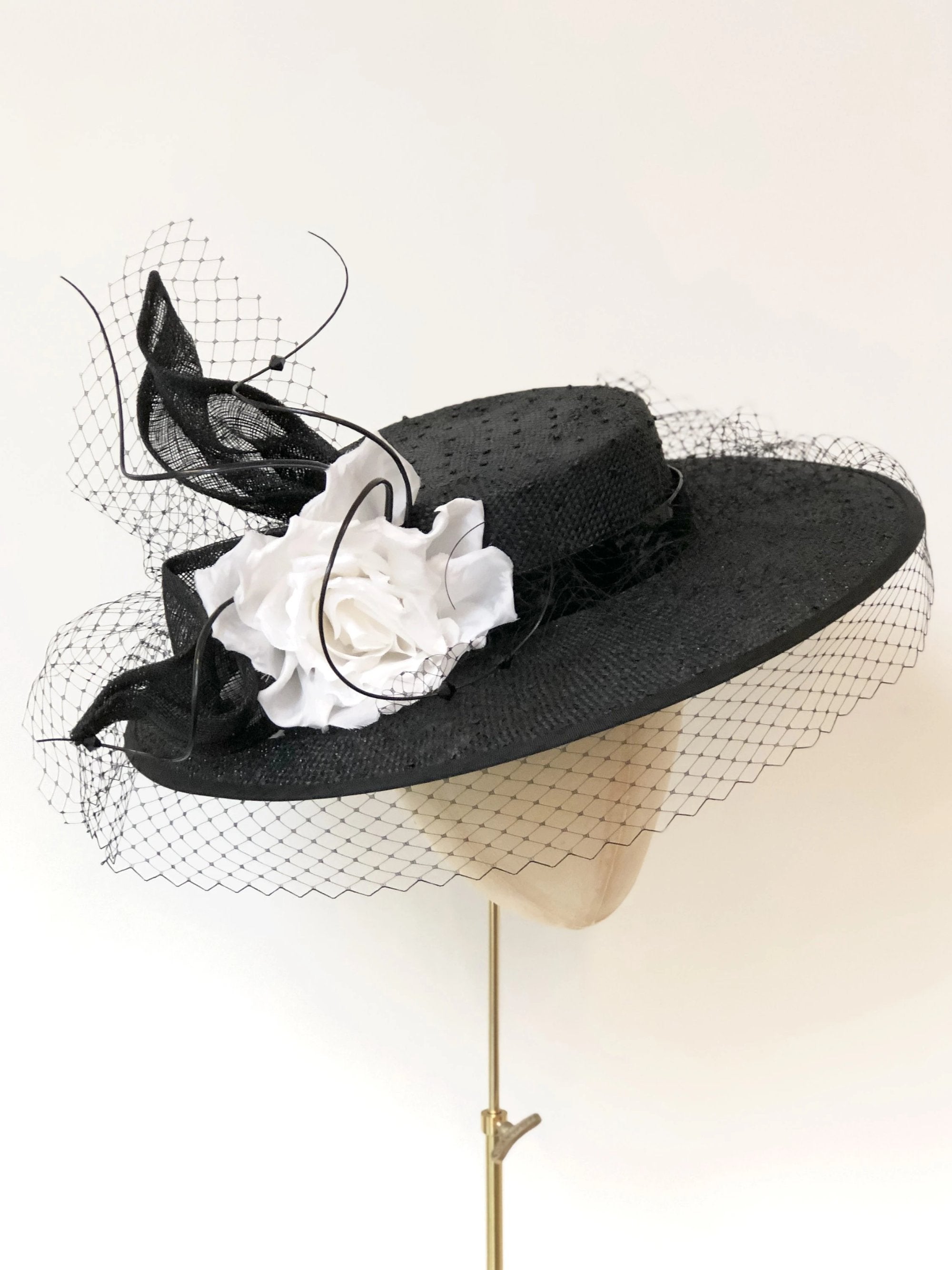 black knotted straw wide boater hat for ladies, royal ascot races, with white silk flower starw sinamy twist, black quills and black veiling