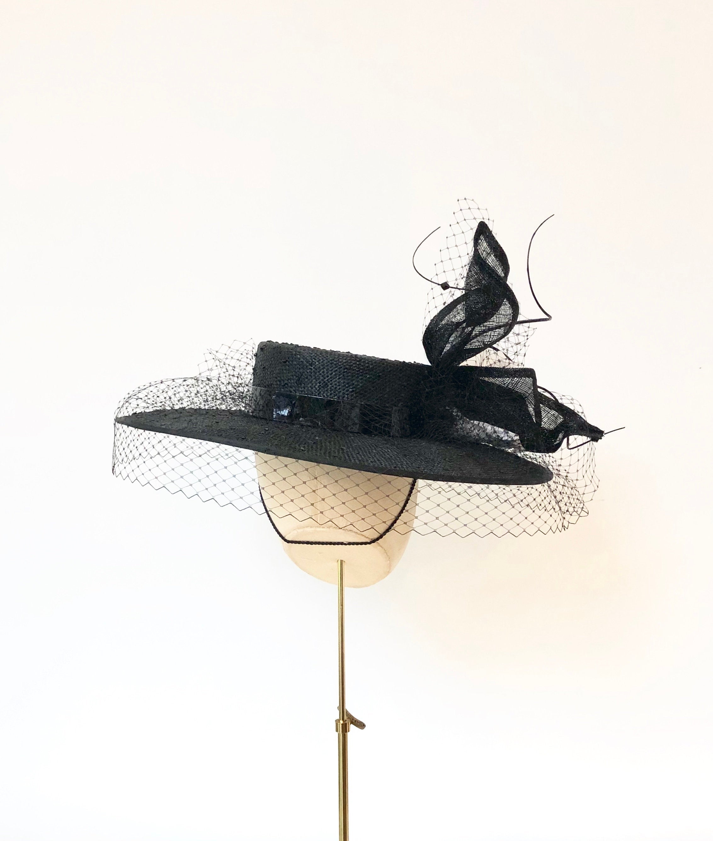 black knotted straw wide boater hat for ladies, royal ascot races, with white silk flower starw sinamy twist, black quills and black veiling