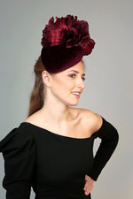 burgundy velvet teardrop fascinator hat, ideal for winter weddings, with large silk flower and silk abaca loops