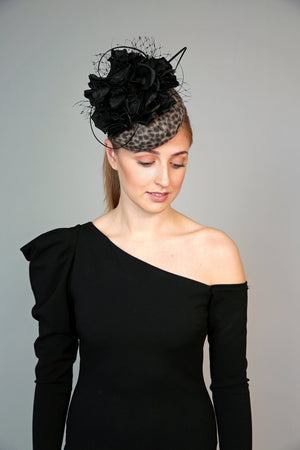 leopard animal print pillbox fascinator hat with large black silk flower, veiling crystals and quills