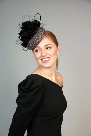 leopard animal print pillbox fascinator hat with large black silk flower, veiling crystals and quills