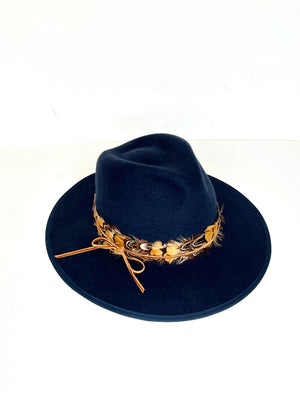 navy blue wool felt fedora with natural feather band