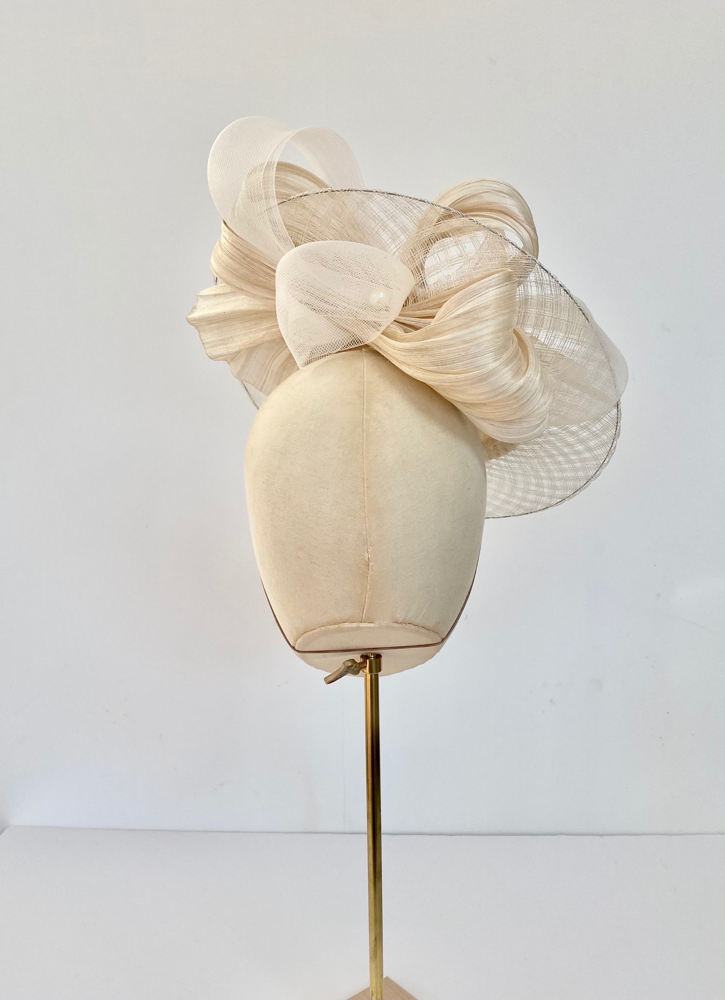 ivory wedding hat, disc style hat with bow
