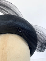 close up details of pleated crin headband