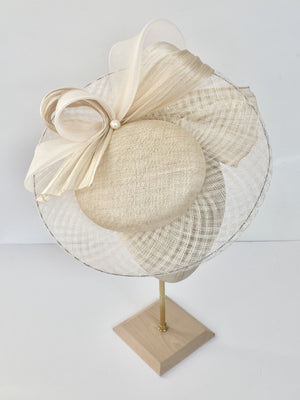 ivory saucer style hat with window pane edge abca loops