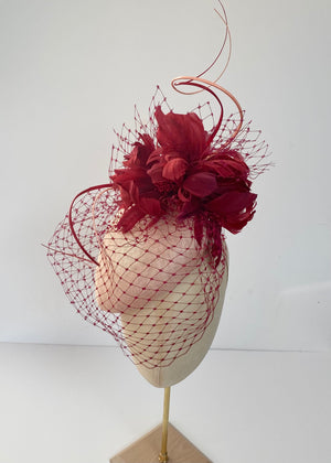 red  Royal Ascot hat with veiling