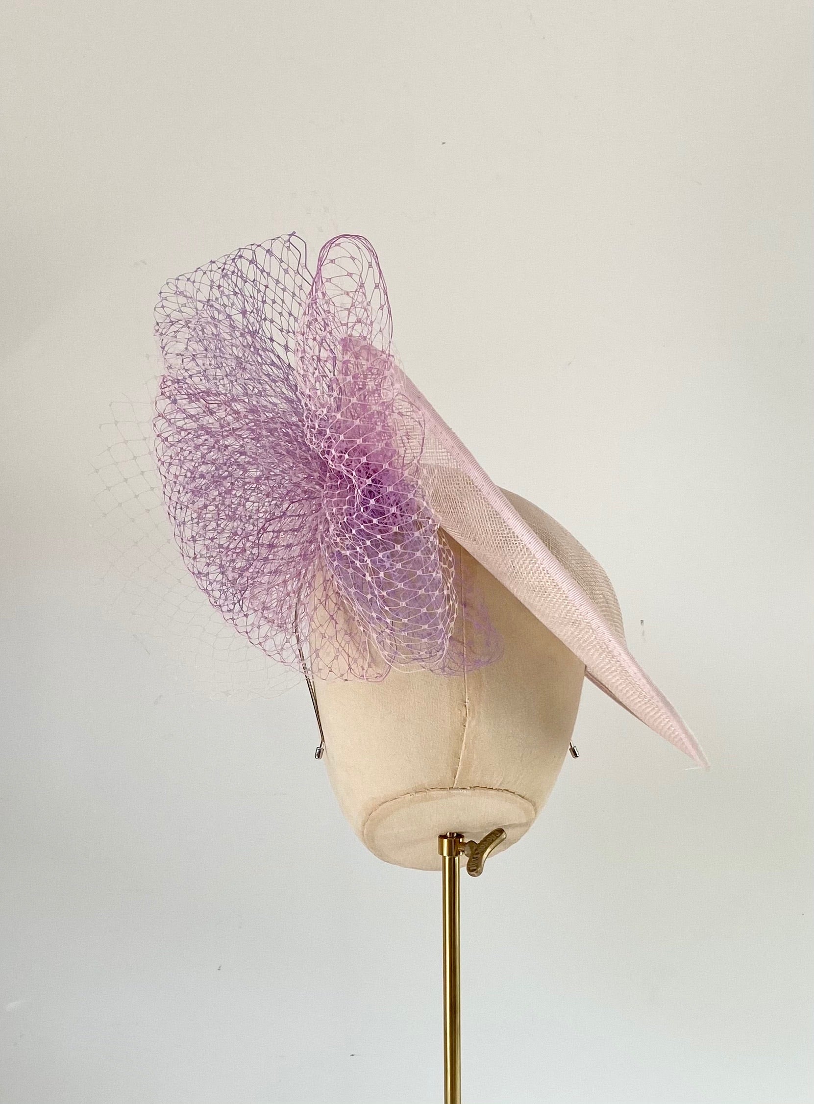 soft pink disc hat with mauve lavender veiling