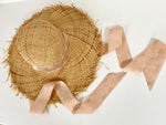 floppy straw sun hat with pink ribbon