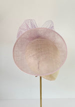 soft pink disc saucer hat with lavender lilac mauve tones veiling wedding hat Royal Ascot