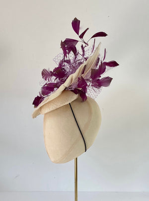 ivory disc saucer hat with feather and veiling