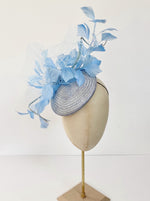 light blue fascinator hat with feathers and veiling mother of the bride, Royal Ascot button cocktail hat