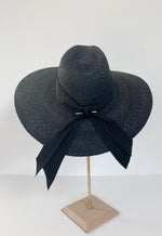 large wide brimmed sun hat Moira rose inspired