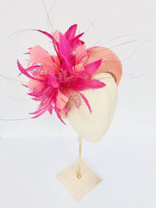 orange and pink straw padded wide headband, kate middleton style with vibrant feather spray, halo crown, ideal for races or wedding hat