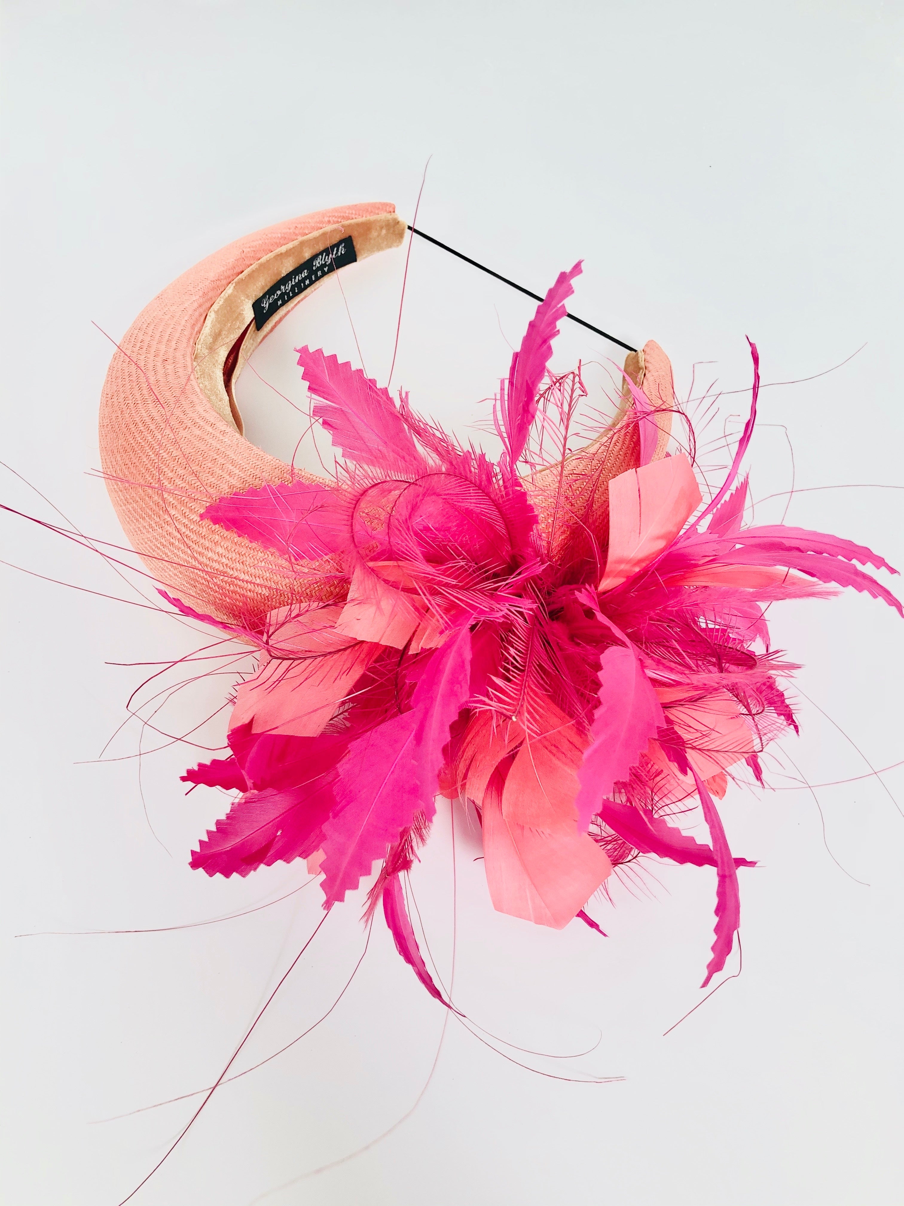 orange and pink straw padded wide headband, kate middleton style with vibrant feather spray, halo crown, ideal for races or wedding hat