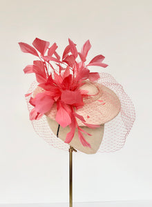 coral and peach panama disc saucer fascinator hat with coral feather spray and coral veiling